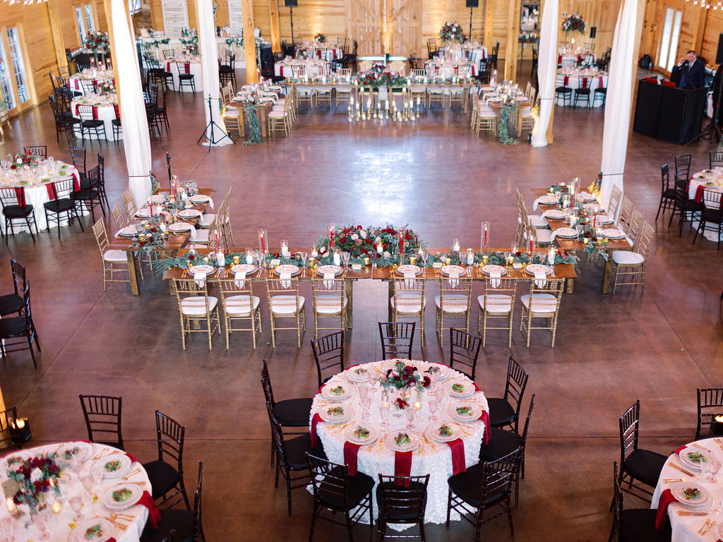 Wedding reception layout with farm table rentals at The Middleburg Barn in Middleburg, VA